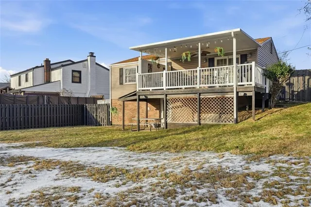 a house view with a outdoor space