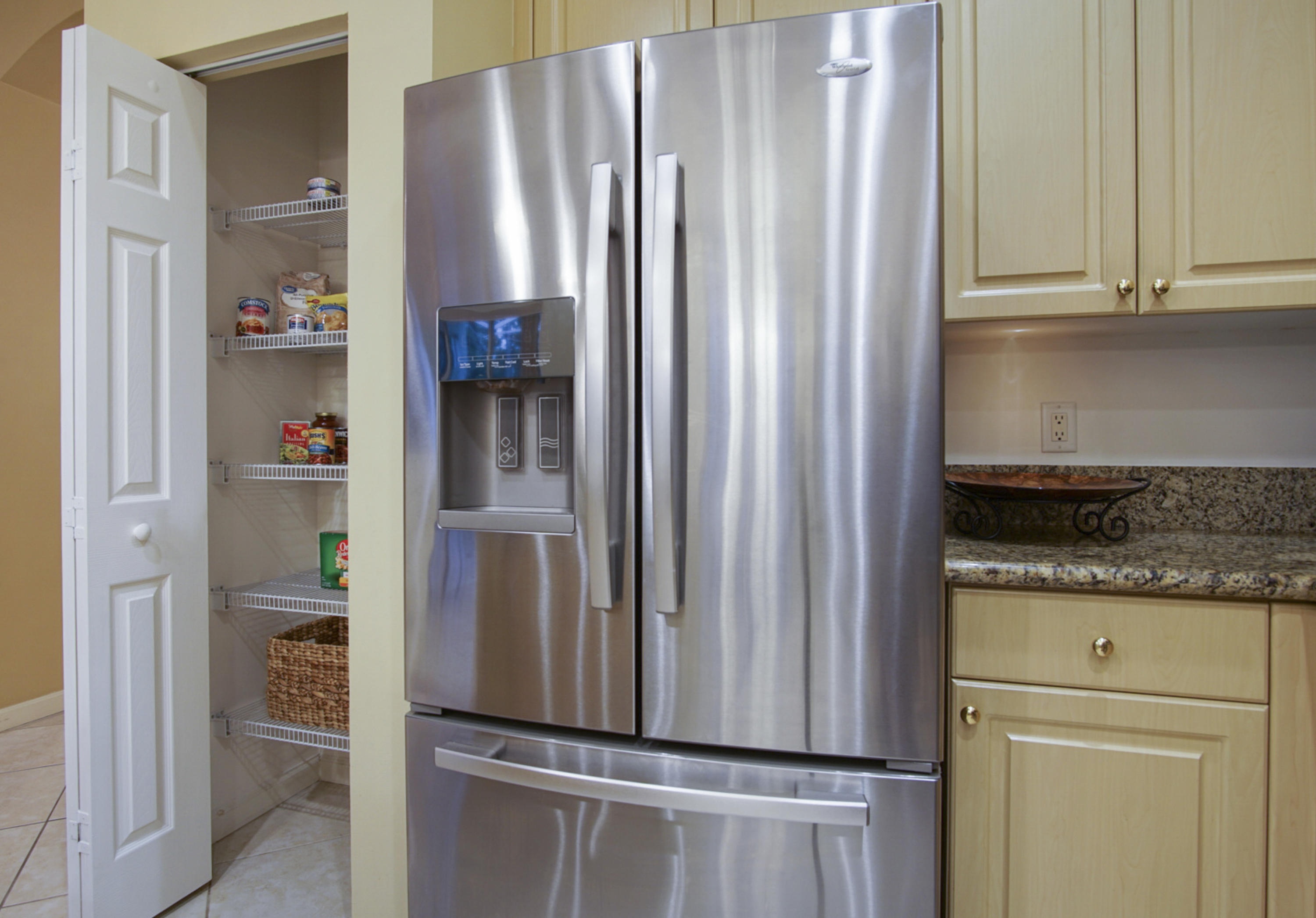 341 Springview Loop Port St. Lucie, FL 34986 - Photo 11 of 122 pantry - fridge