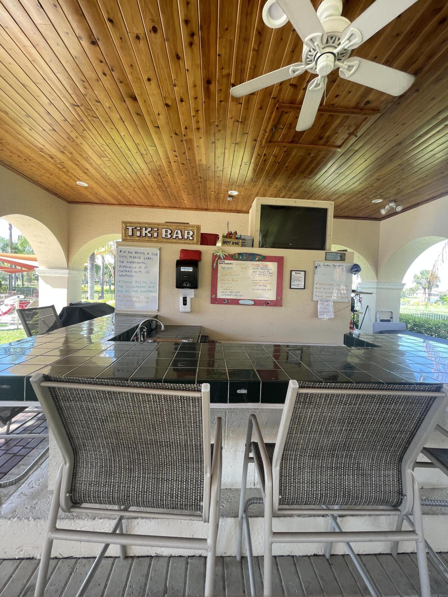 341 Springview Loop Port St. Lucie, FL 34986 - Photo 35 of 122 pool tiki bar