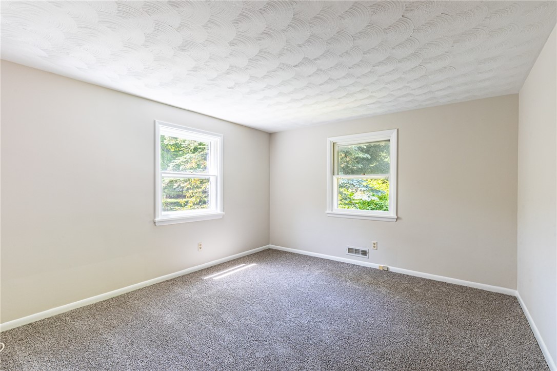 274 Parkview Drive Rochester, NY 14625 - Photo 26 of 41 Bedroom 1 with plenty of natural light.