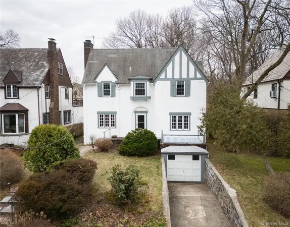 a view of multiple house with yard