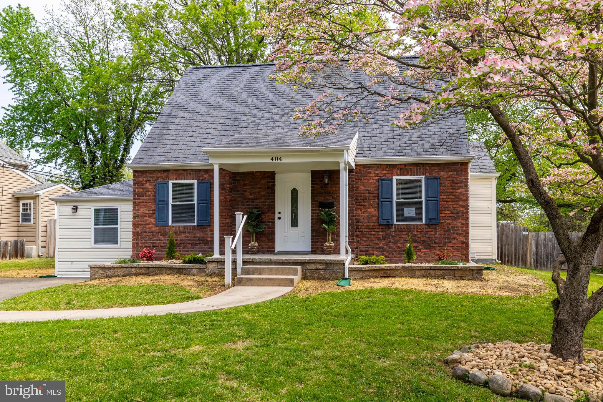 404 Crescent Road Hatboro, PA 19040 - Photo 1 of 18 a front view of house with yard and green space