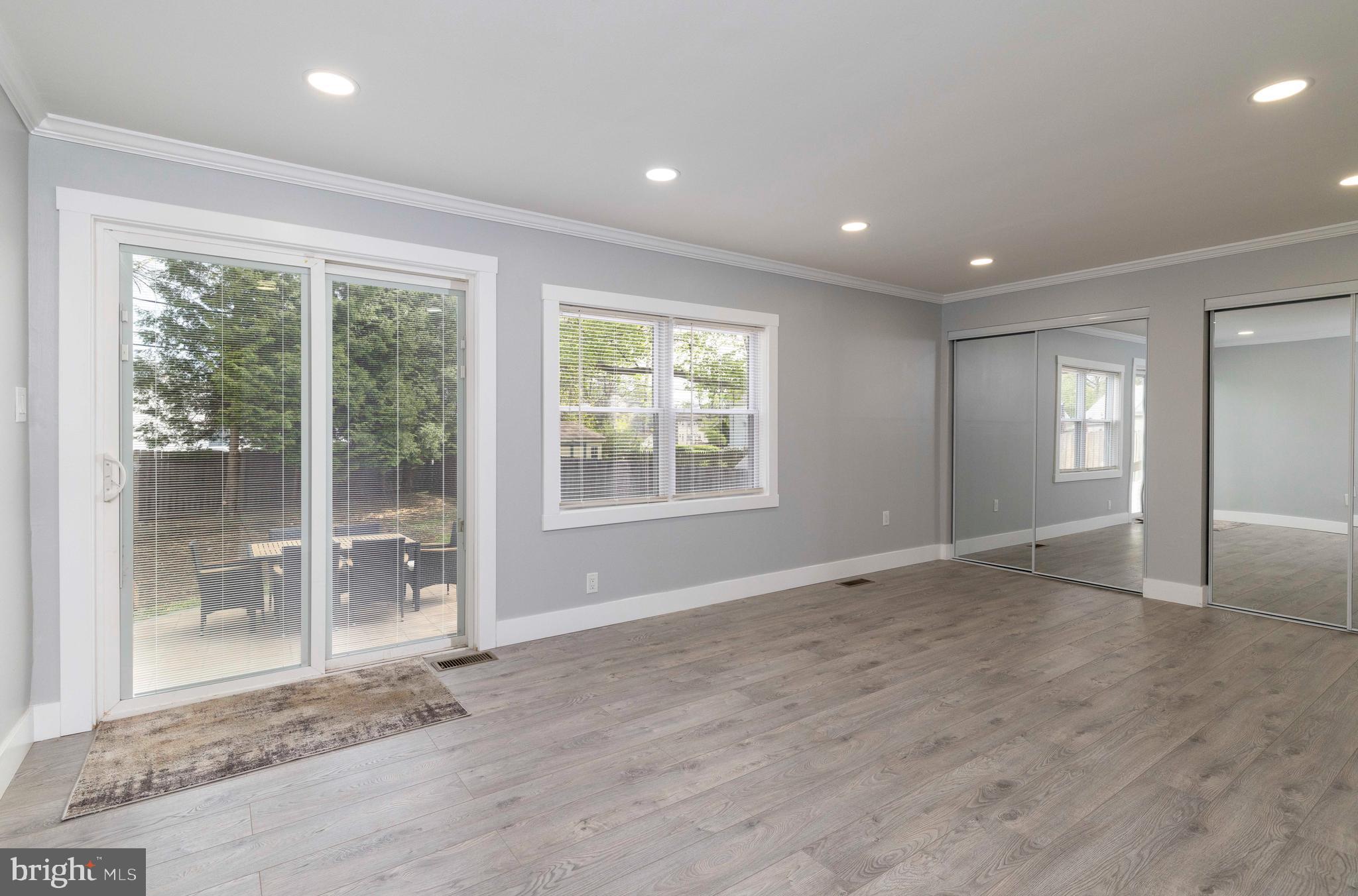 404 Crescent Road Hatboro, PA 19040 - Photo 11 of 18 a view of an empty room with wooden floor and a window