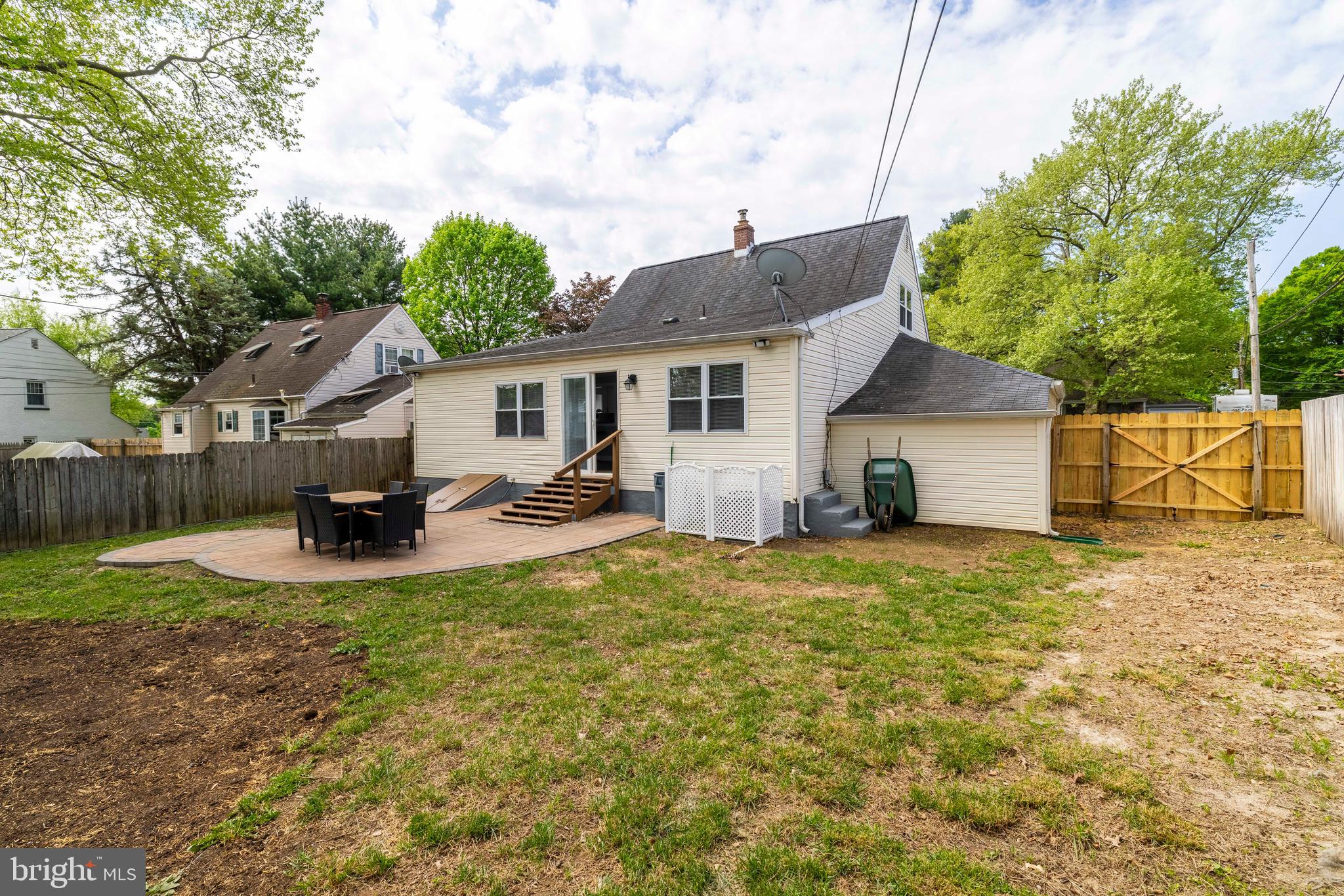 404 Crescent Road Hatboro, PA 19040 - Photo 17 of 18 a view of a house with backyard and sitting area