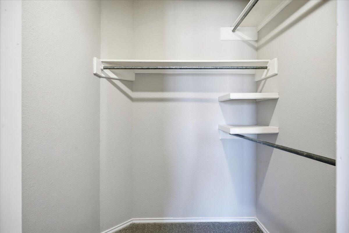 2301 92nd Street Lubbock, TX 79423 - Photo 18 of 30 a close view of closet