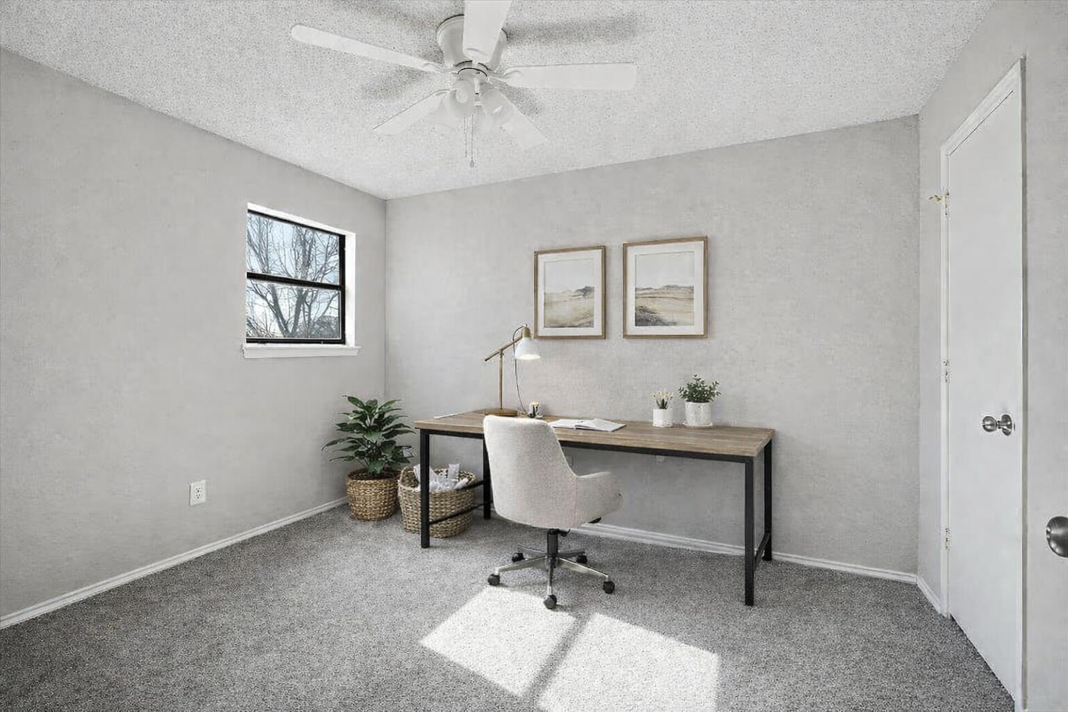 2301 92nd Street Lubbock, TX 79423 - Photo 24 of 30 a view of a workspace with a window
