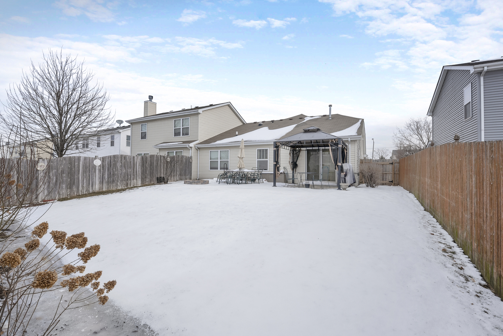 3625 Harms Road Joliet, IL 60435 - Photo 14 of 18 a front view of a house with a yard