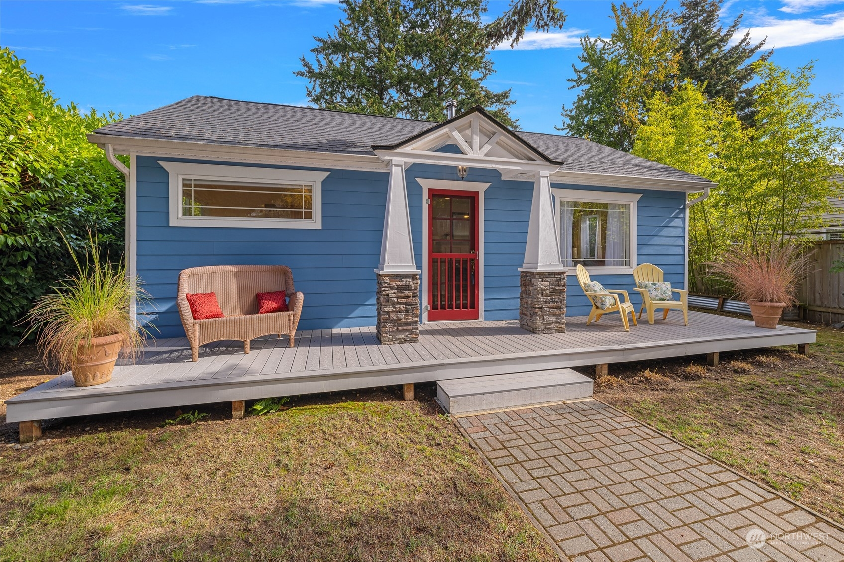 9734 31st Avenue Southwest Seattle, WA 98126 - Photo 1 of 29 a front view of a house with swimming pool and porch