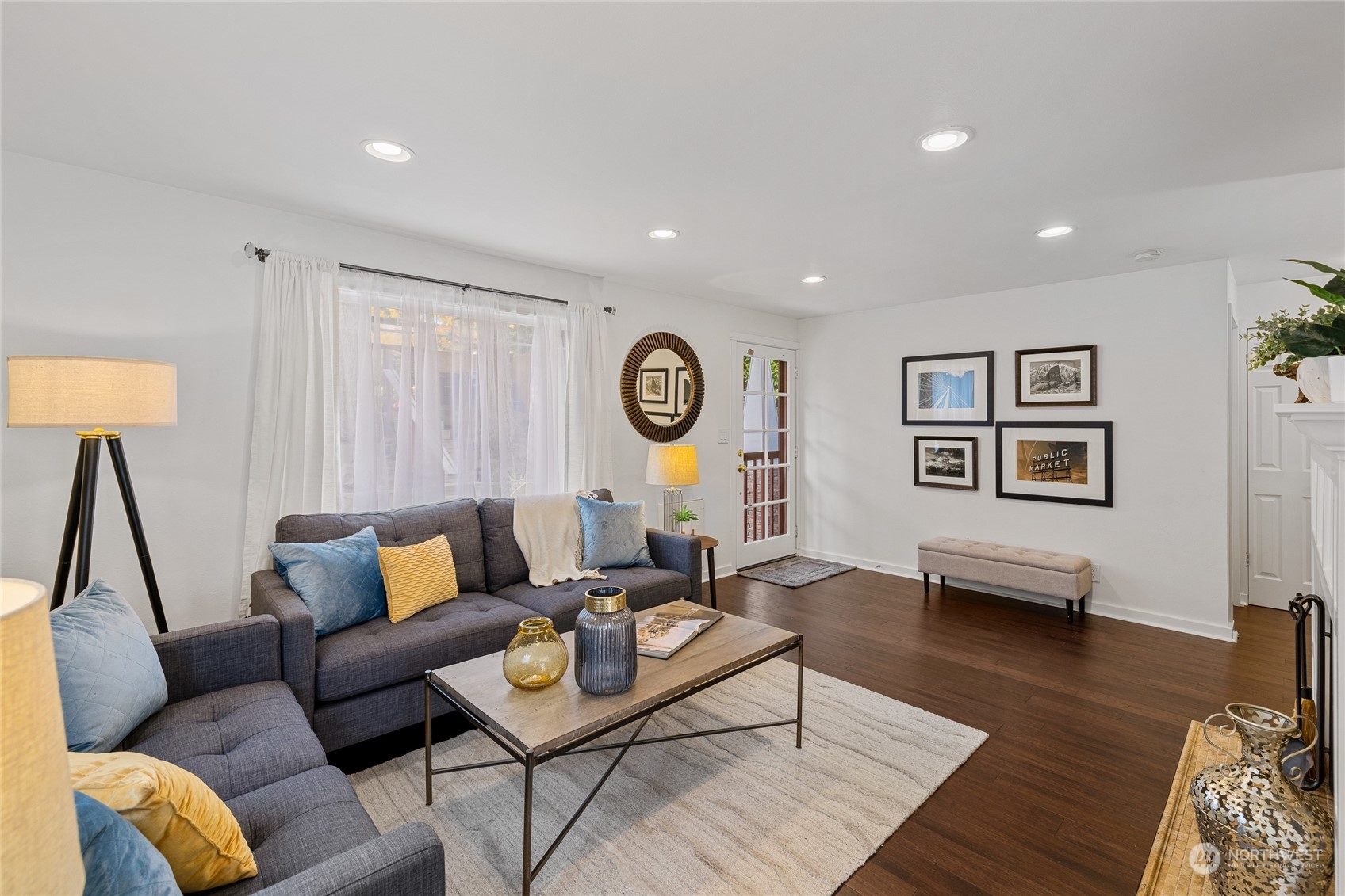 9734 31st Avenue Southwest Seattle, WA 98126 - Photo 2 of 29 a living room with furniture kitchen view and a window
