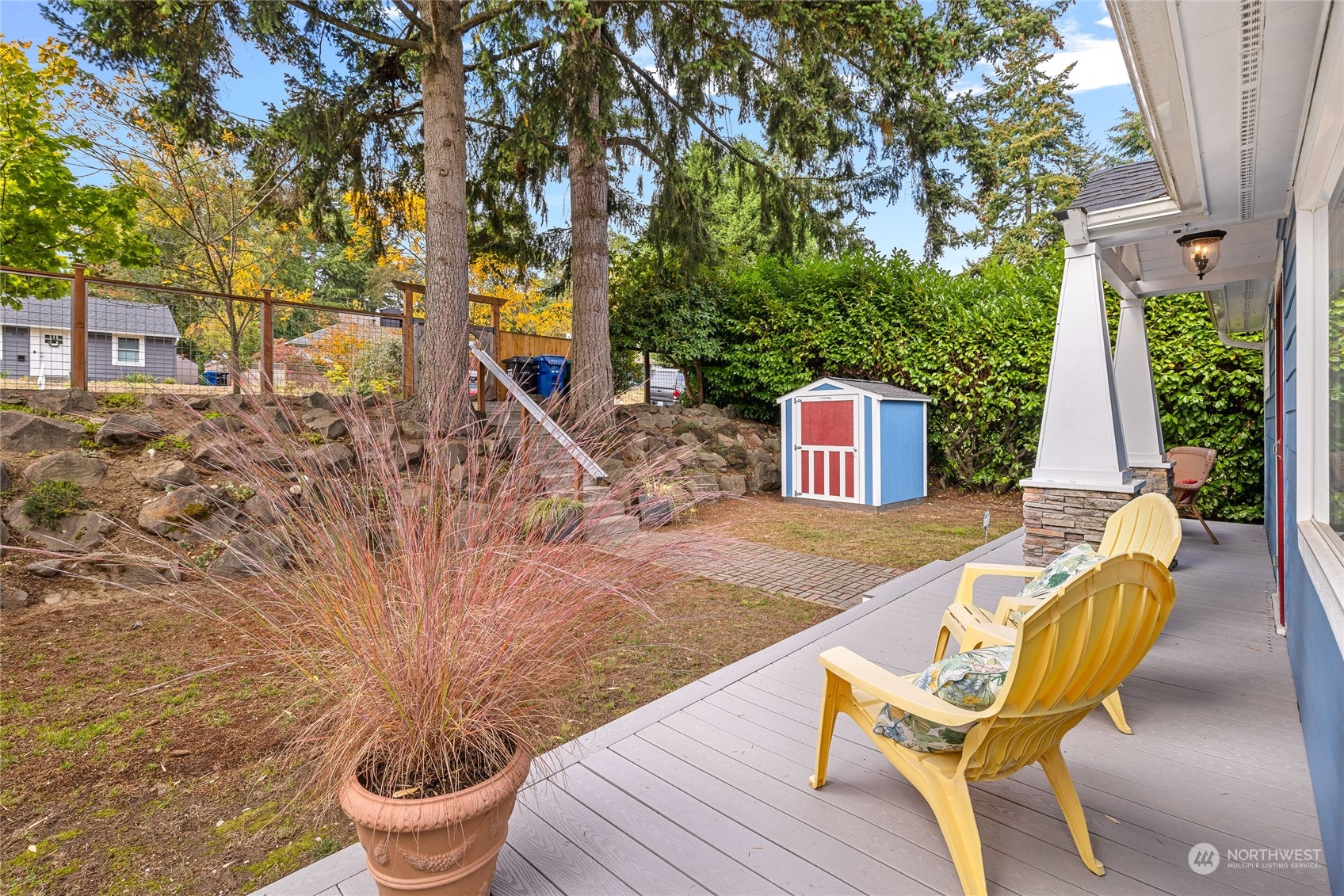 9734 31st Avenue Southwest Seattle, WA 98126 - Photo 26 of 29 a view of a chairs and table in backyard