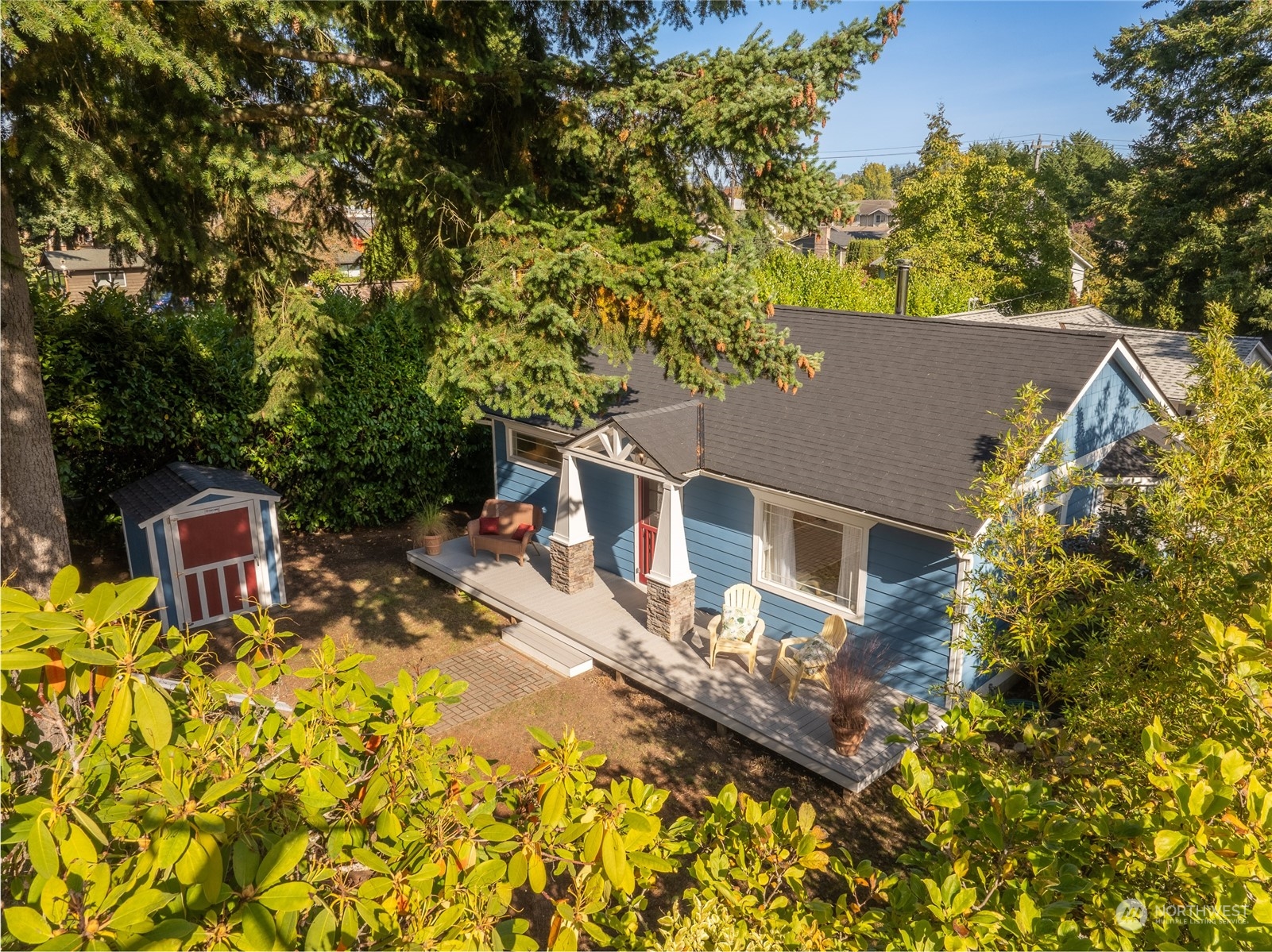 9734 31st Avenue Southwest Seattle, WA 98126 - Photo 27 of 29 front view of a house with a yard