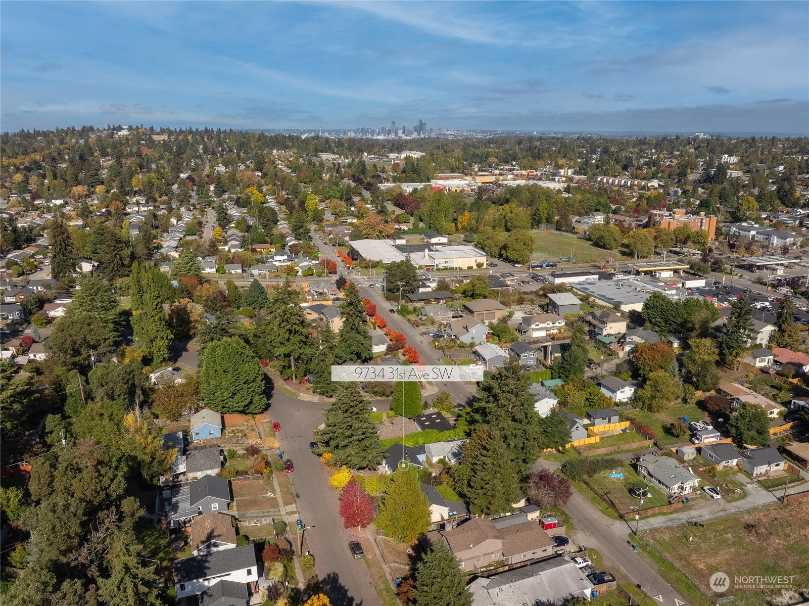 9734 31st Avenue Southwest Seattle, WA 98126 - Photo 28 of 29 an aerial view of residential building with yard