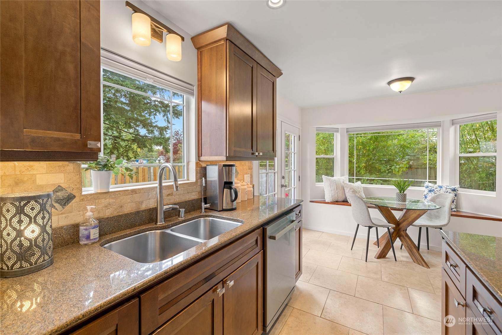 9734 31st Avenue Southwest Seattle, WA 98126 - Photo 8 of 29 a kitchen with a sink and a large window