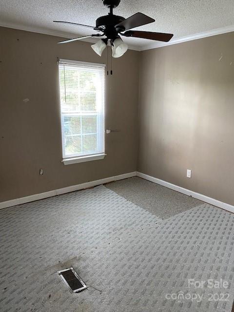1724 Ruben Road, Unit 5 Monroe, NC 28112 - Photo 11 of 13 a view of an empty room with a window