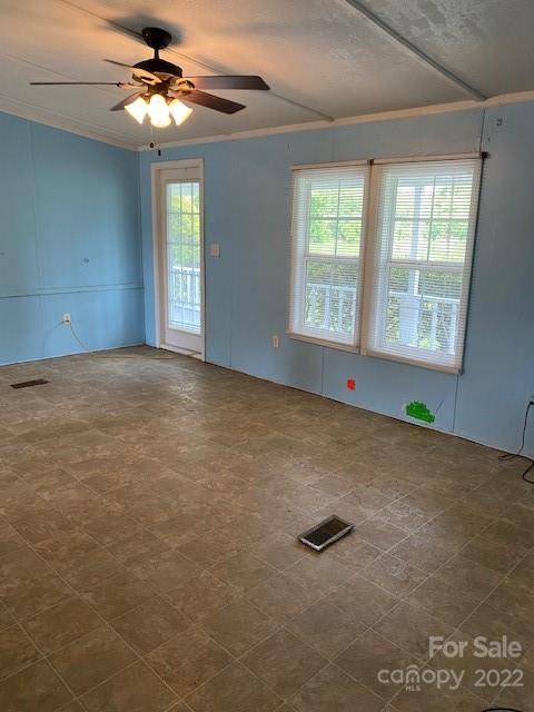1724 Ruben Road, Unit 5 Monroe, NC 28112 - Photo 6 of 13 a view of an empty room with a window
