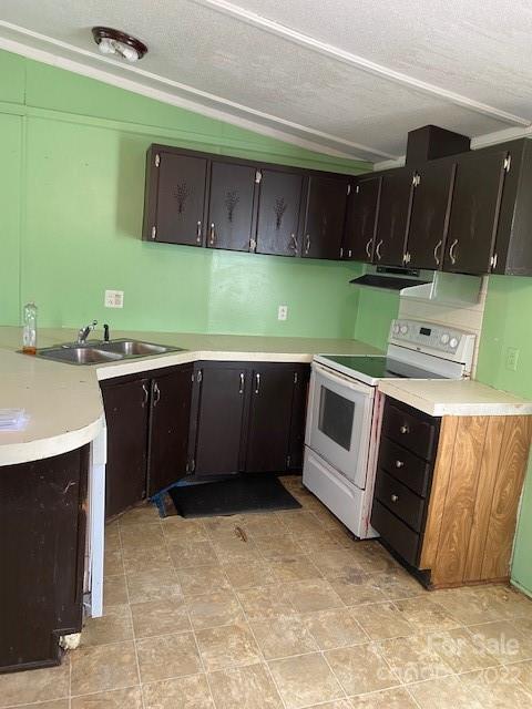1724 Ruben Road, Unit 5 Monroe, NC 28112 - Photo 7 of 13 a kitchen with a sink and a stove top oven