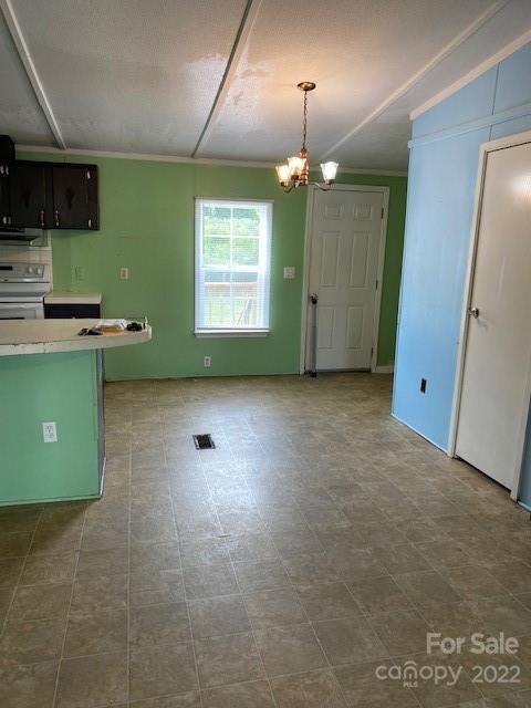 1724 Ruben Road, Unit 5 Monroe, NC 28112 - Photo 8 of 13 an empty room with kitchen fireplace and a sink