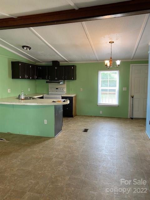 1724 Ruben Road, Unit 5 Monroe, NC 28112 - Photo 9 of 13 a view of an empty room with a kitchen