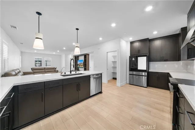 a view of a dining room with furniture and window