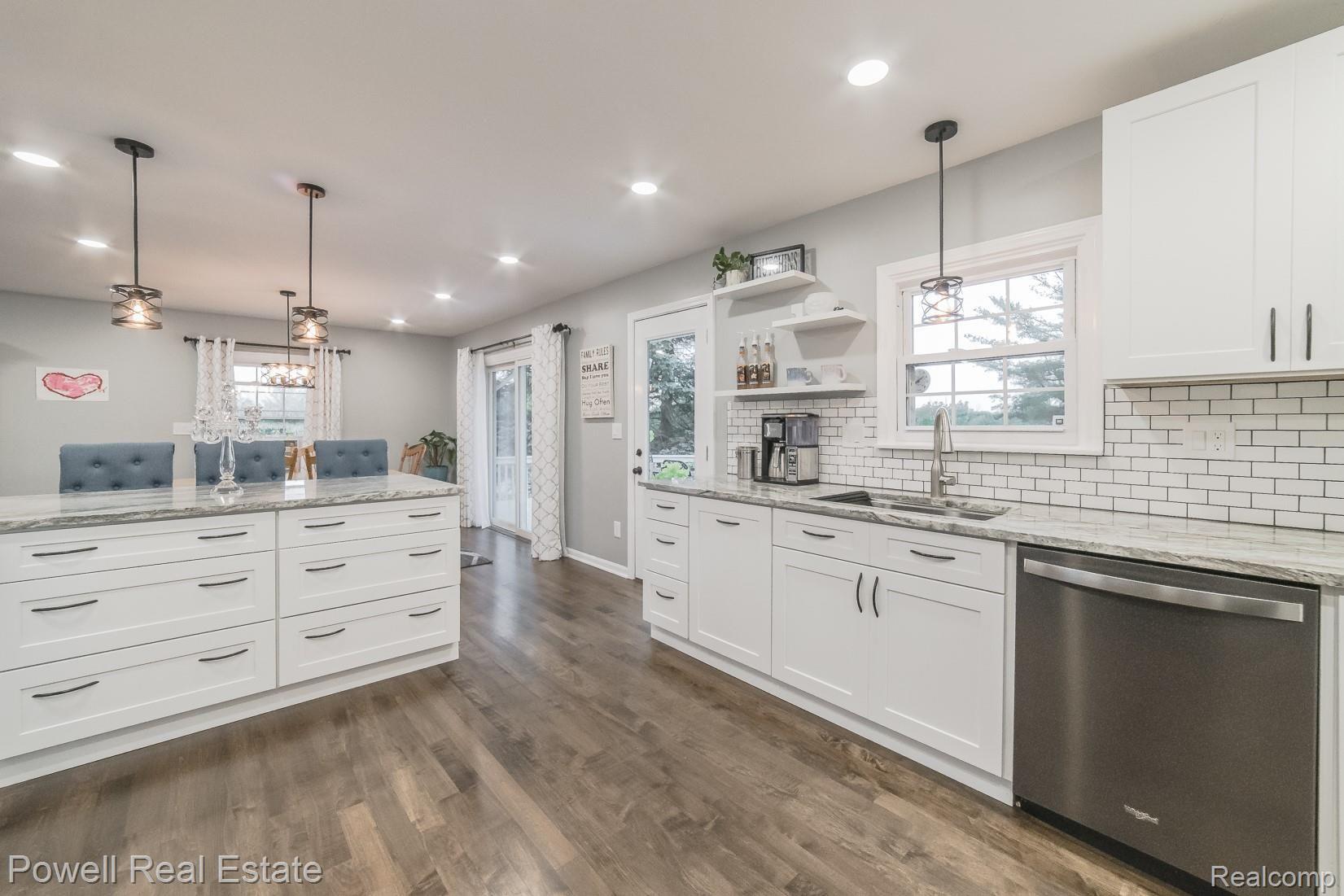 100 Gilmour Road Leonard, MI 48367 - Photo 10 of 29 SEATING AND AN ABUNDANCE OF STORAGE