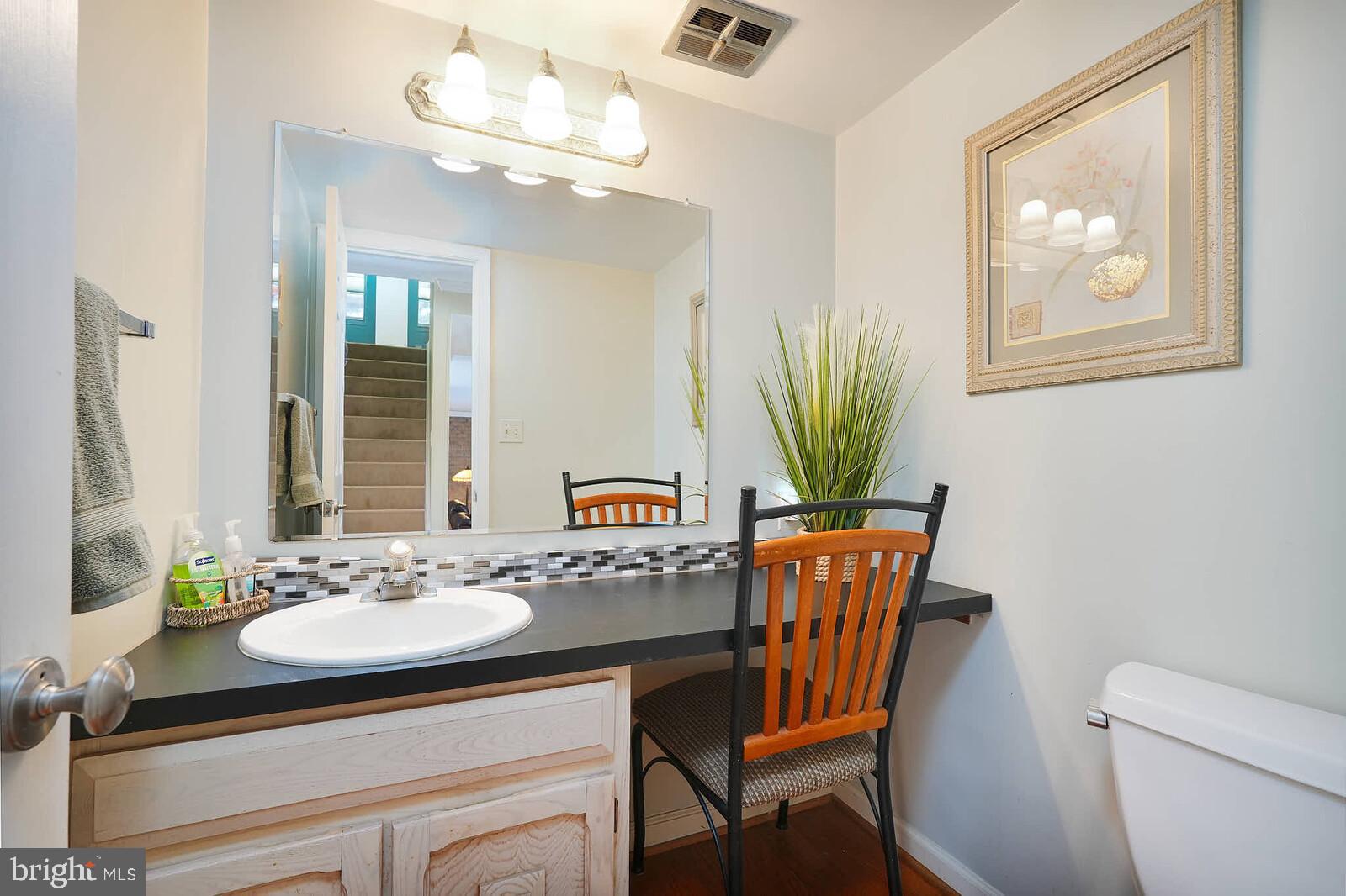 14513 Notley Road Silver Spring, MD 20905 - Photo 24 of 43 Main level half bath