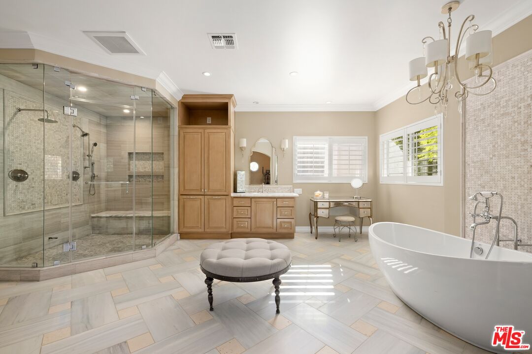 25217 Eldorado Meadow Road Hidden Hills, CA 91302 - Photo 13 of 26 a bathroom with a tub a toilet and a shower