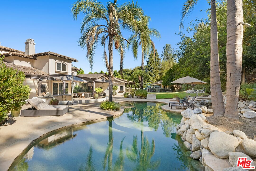 25217 Eldorado Meadow Road Hidden Hills, CA 91302 - Photo 16 of 26 a view of multiple houses with yard