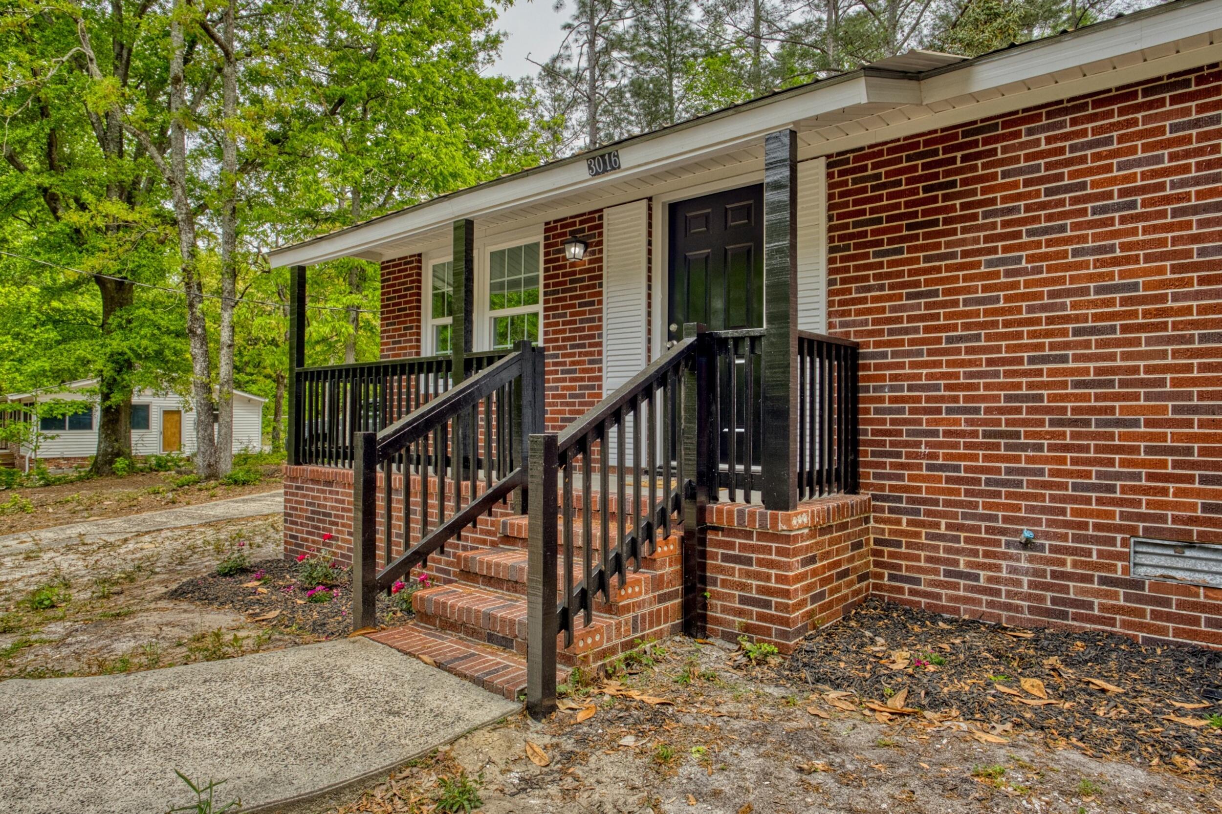 3016 Wagener Road Aiken, SC 29801 - Photo 7 of 29 a view of a house with backyard and deck