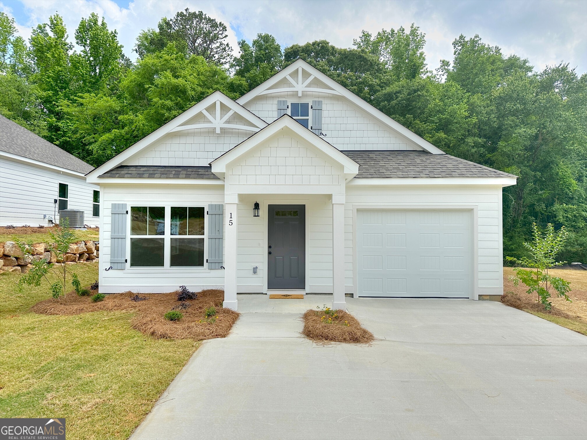 15 River's Edge Lane Franklin, GA 30217 - Photo 1 of 1 a front view of a house with a yard and potted plants