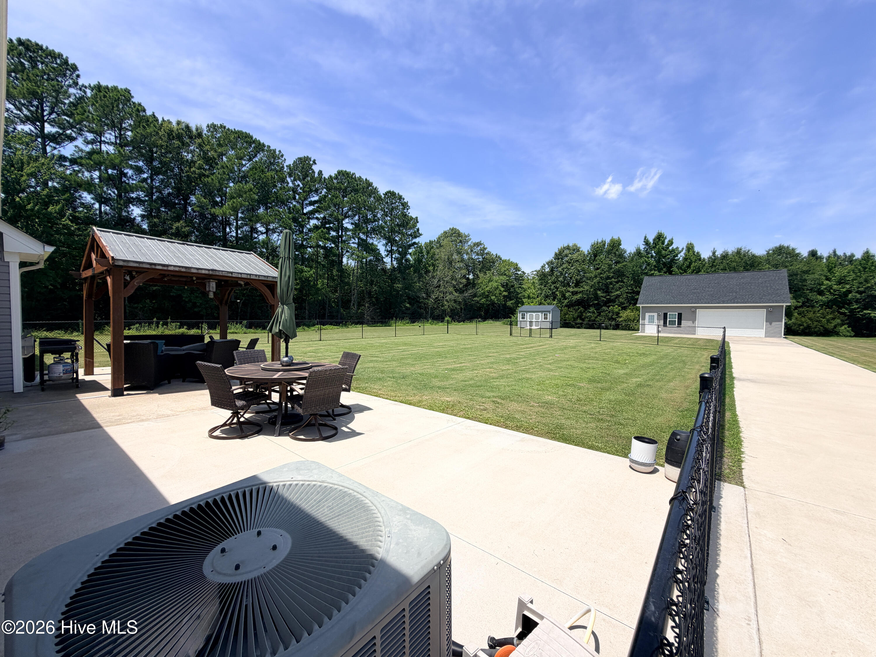 270 Keeter Barn Road South Mills, NC 27976 - Photo 26 of 45 PARTIALLY FENCED BACKYARD W/ GAZEBO