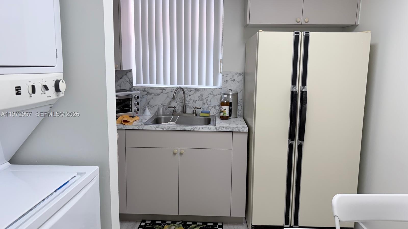 199 Southwest 12th Avenue, Unit 415B Miami, FL 33130 - Photo 20 of 39 a bathroom with a sink toilet and shower