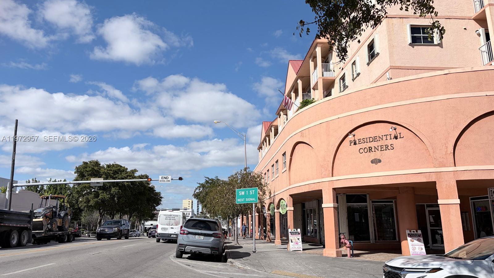 199 Southwest 12th Avenue, Unit 415B Miami, FL 33130 - Photo 2 of 39 a view of a street with cars