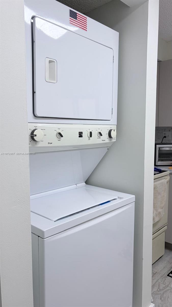 199 Southwest 12th Avenue, Unit 415B Miami, FL 33130 - Photo 22 of 39 a close up view of washer and dryer