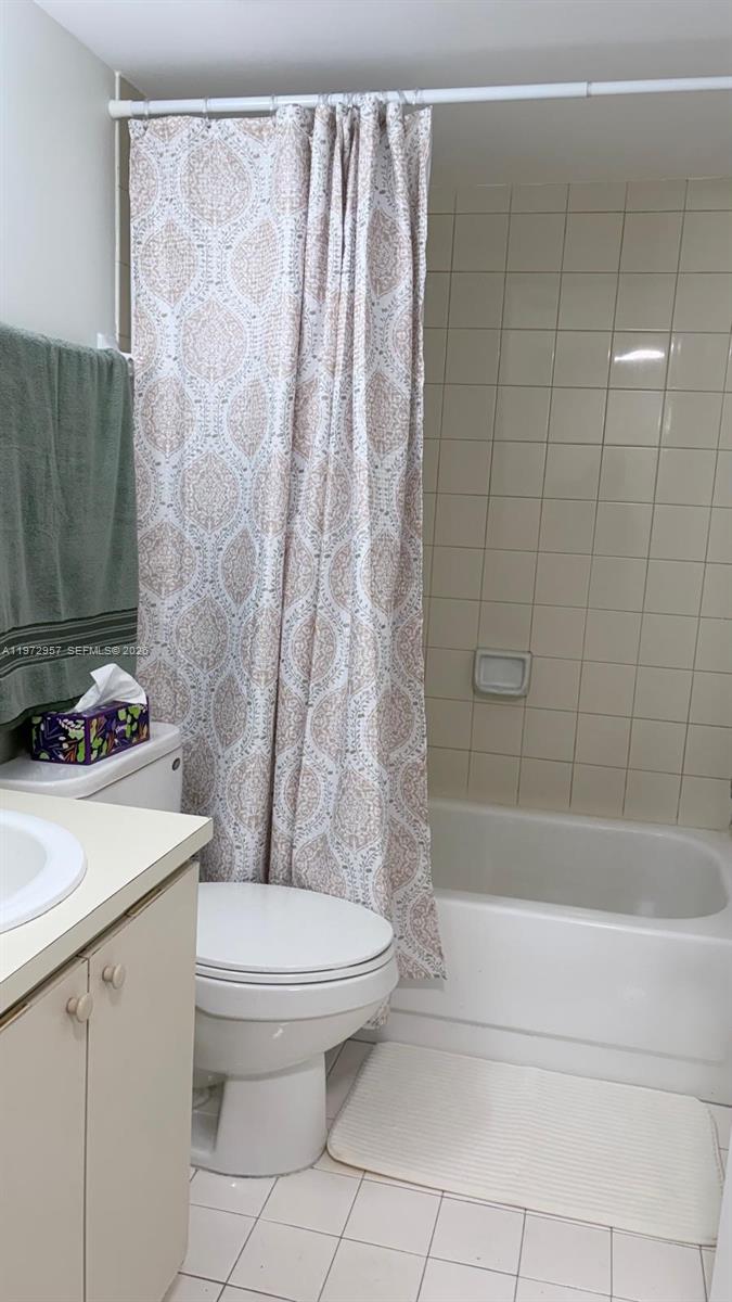 199 Southwest 12th Avenue, Unit 415B Miami, FL 33130 - Photo 23 of 39 a bathroom with a sink a toilet and shower