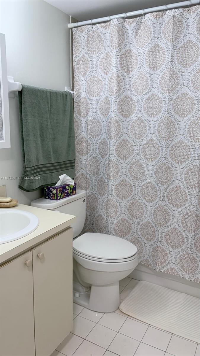 199 Southwest 12th Avenue, Unit 415B Miami, FL 33130 - Photo 24 of 39 a bathroom with a toilet and a sink