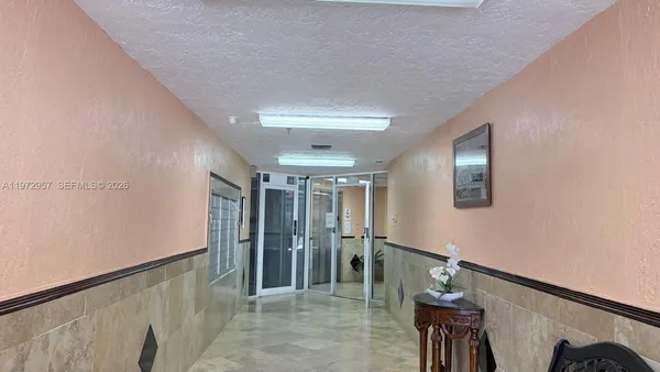 a view of entryway with stairs