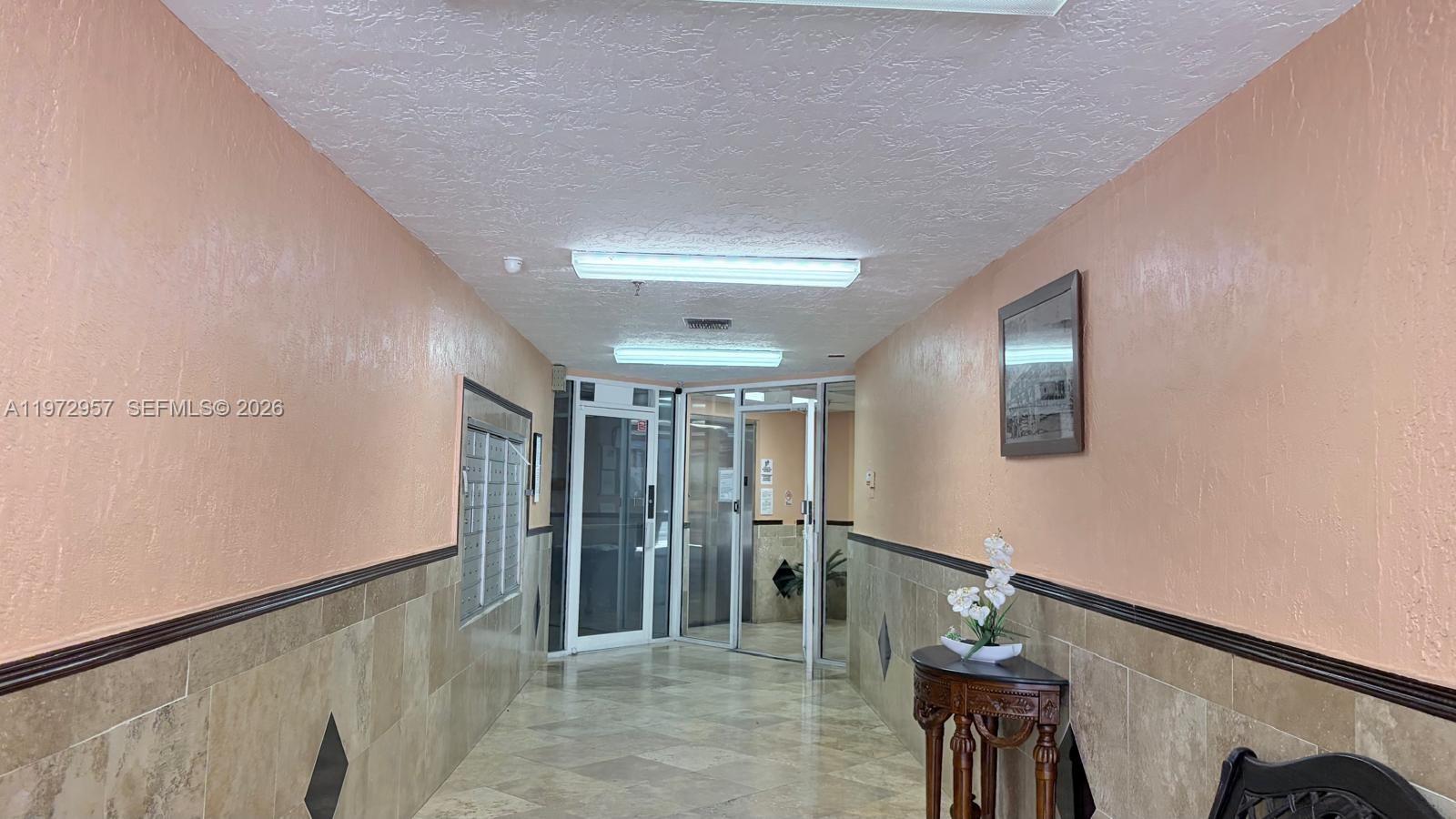 199 Southwest 12th Avenue, Unit 415B Miami, FL 33130 - Photo 6 of 39 a view of entryway with stairs