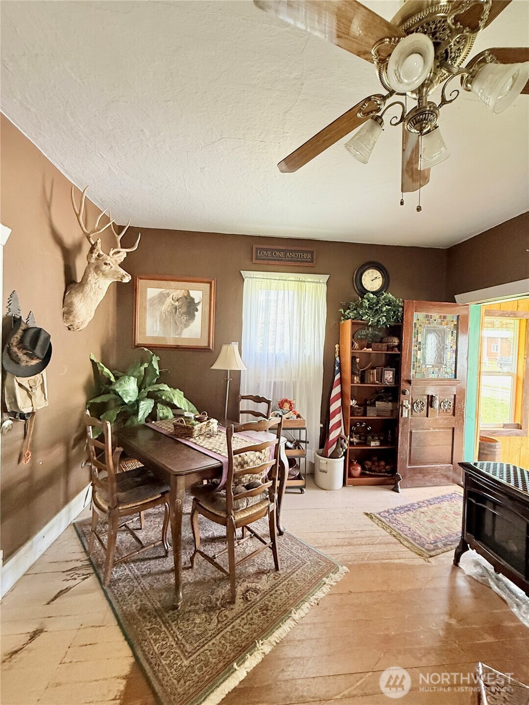 119 North Main Street Conconully, WA 98819 - Photo 15 of 30 a living room with furniture and wooden floor