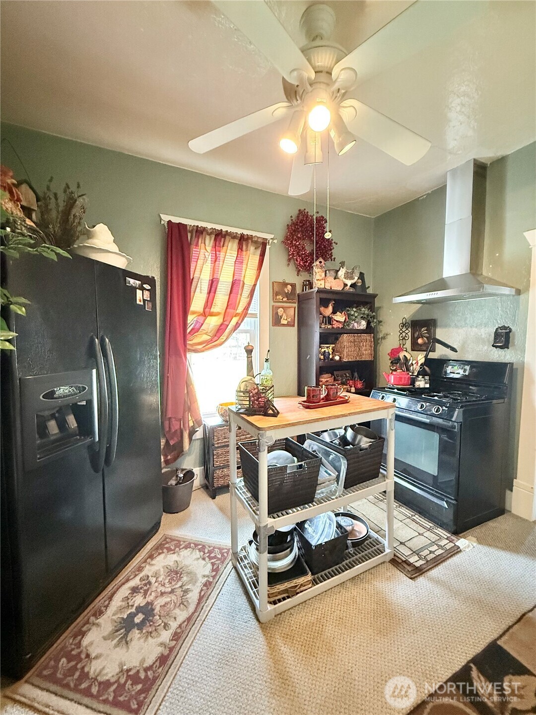 119 North Main Street Conconully, WA 98819 - Photo 20 of 30 a room with lots of wooden furniture and a chandelier
