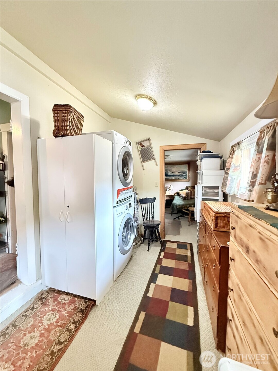 119 North Main Street Conconully, WA 98819 - Photo 29 of 30 a storage room with washer and dryer