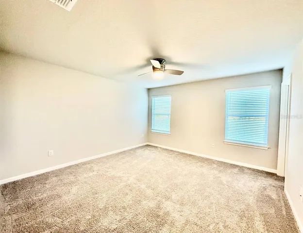 an empty room with a natural light