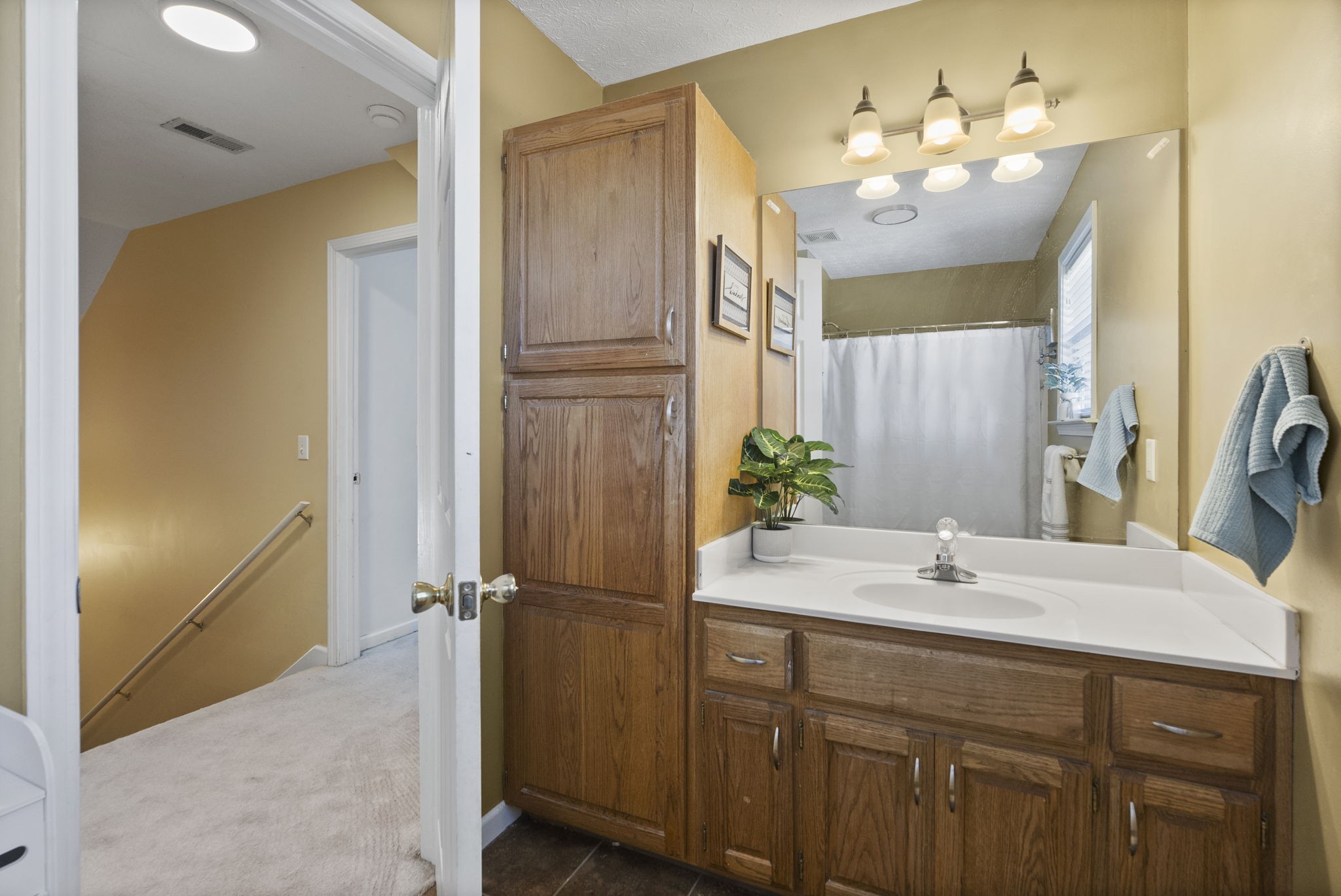 181 Foxrun Springfield, TN 37172 - Photo 28 of 35 a bathroom with a double vanity sink mirror and shower