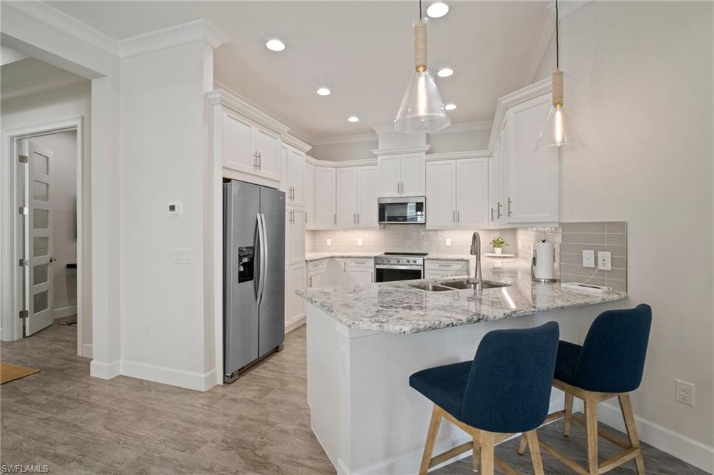 6879 Saona Court Naples, FL 34113 - Photo 10 of 35