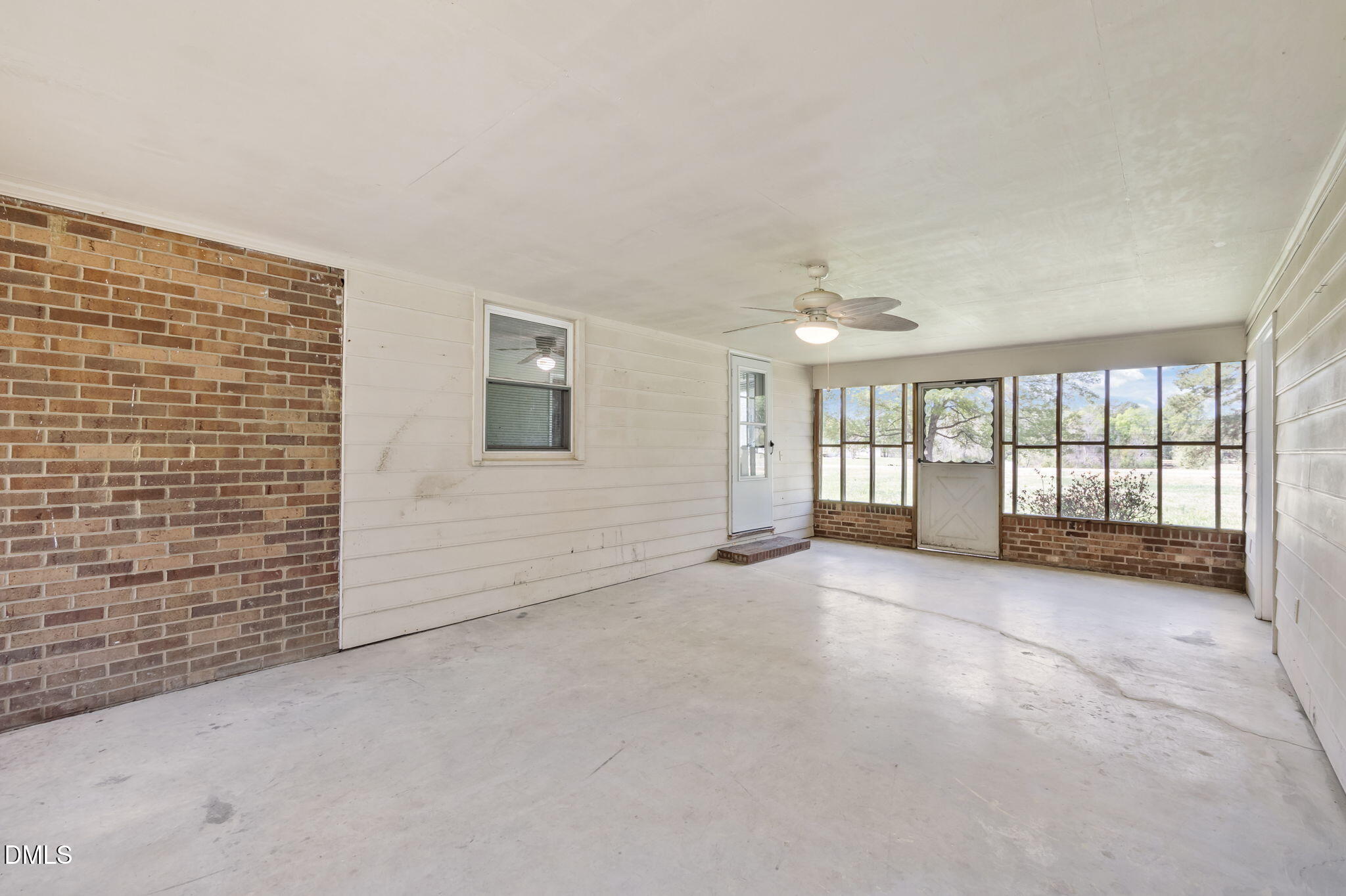 95 Harold Gill Road Roxboro, NC 27574 - Photo 26 of 53 a view of an empty room with a window