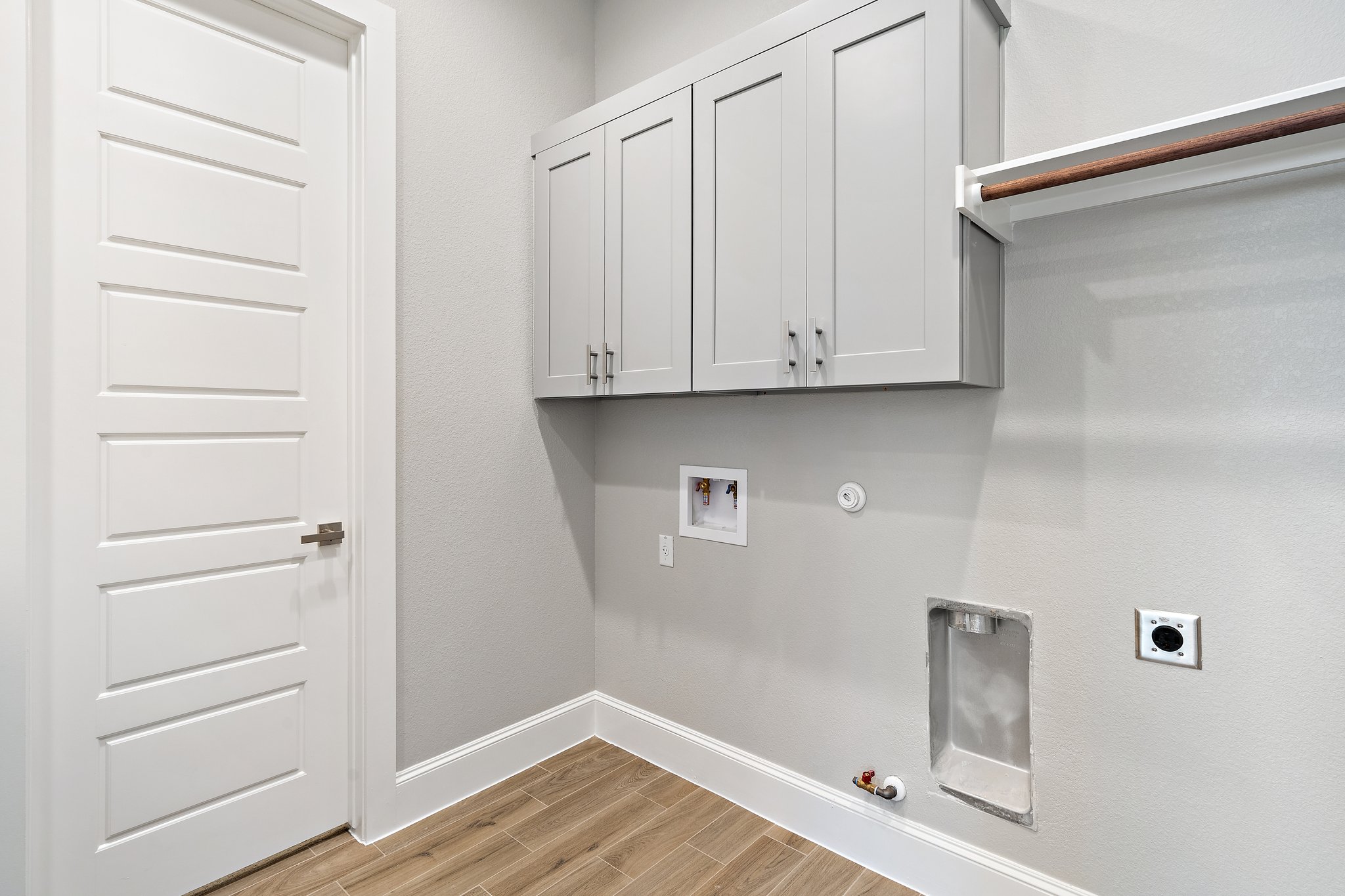 112 Axis Loop Georgetown, TX 78628 - Photo 28 of 39 a view of cabinets and wooden floor
