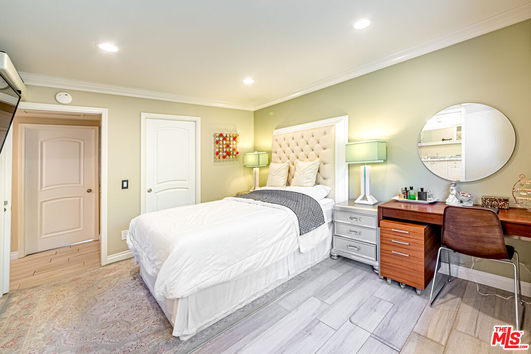 1195 Vía Pintada Riverside, CA 92507 - Photo 20 of 51 a bed room with a bed and a mirror