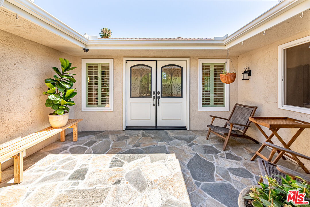 1195 Vía Pintada Riverside, CA 92507 - Photo 3 of 51 a front view of a house with a yard