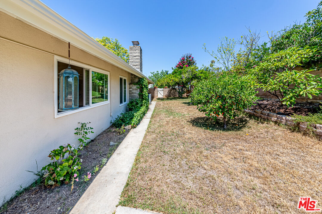 1195 Vía Pintada Riverside, CA 92507 - Photo 37 of 51 a view of a backyard with flowers