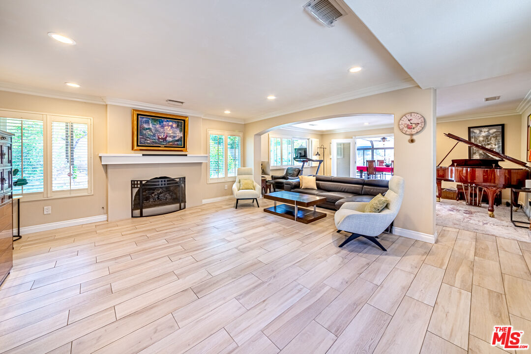 1195 Vía Pintada Riverside, CA 92507 - Photo 5 of 51 a living room with furniture and a fireplace