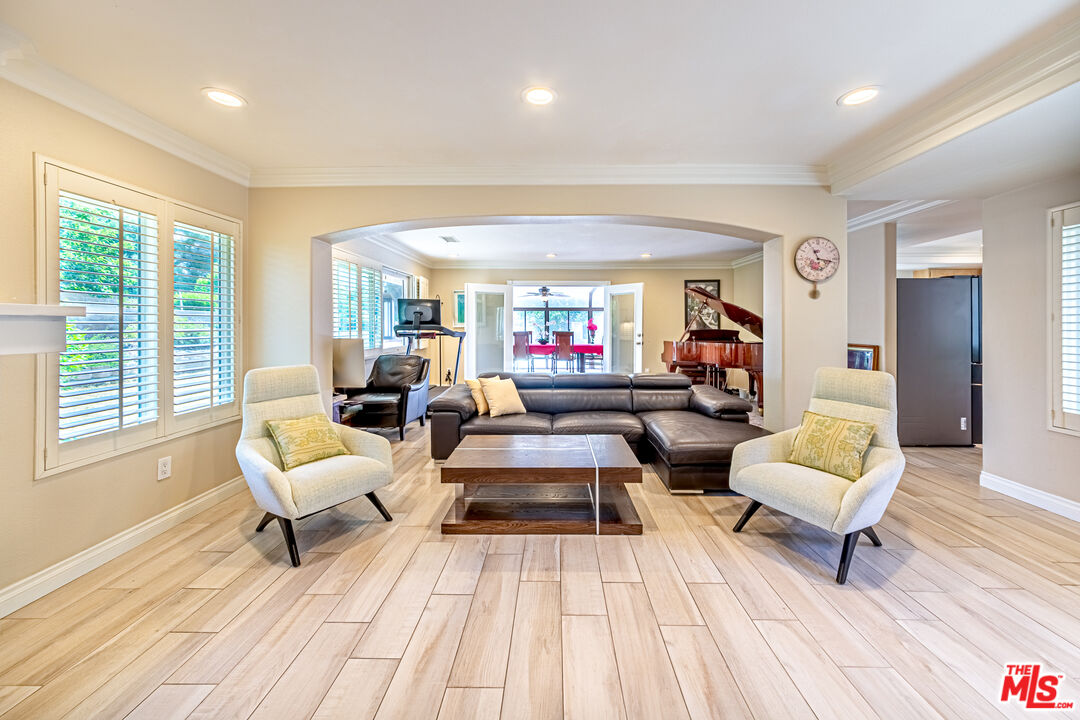 1195 Vía Pintada Riverside, CA 92507 - Photo 6 of 51 a living room with furniture and a lamp